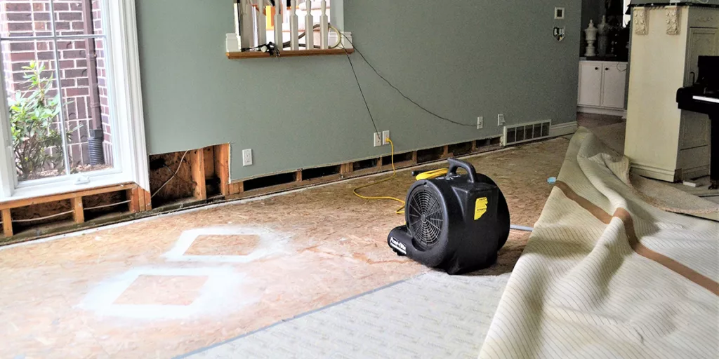 water damage can really mess up your walls. This picture shows the cut out drywall that got wet with a powerful fan blowing into it.